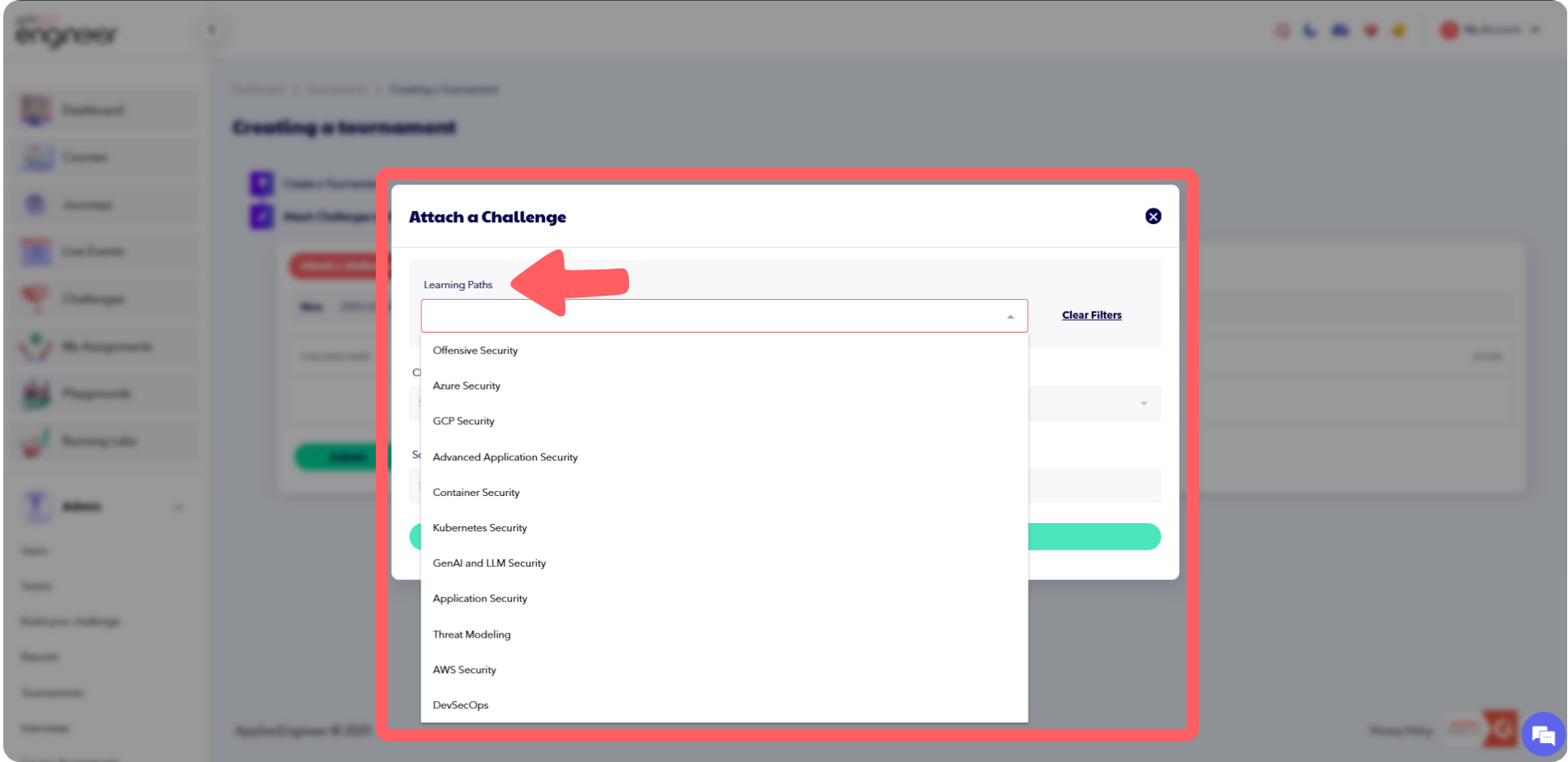 Screenshot of clicking on 'Attach Challenge' to attach an existing challenge to a tournament in the AppSecEngineer platform.